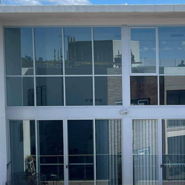 Reflective building window film